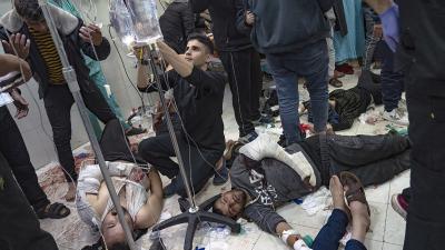 Palestinians being treated on the floor of the hospital in Khan Younis, Gaza Strip, December 5, 2023.