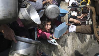 Palestinians line up desperate for food, Rafah, Gaza Strip, January 9, 2024.