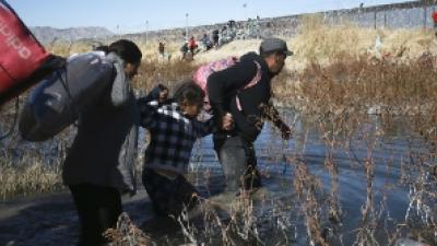 Migrants cross the Rio Grande to reach the United States from Ciudad Juarez, Mexico
