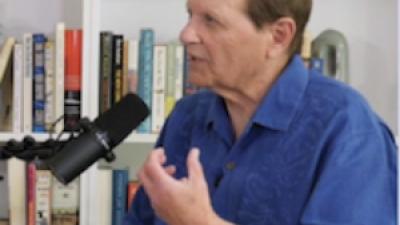 Bob Avakian with microphone