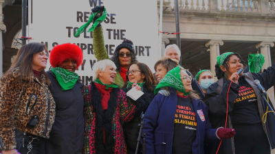 Leading Revcom Sunsara Taylor in the middle with Lori Sokol and other activists with the despicably red-baited abortion rights organization Rise Up for Abortion Rights