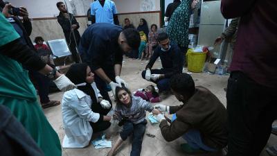 Palestinians wounded in Israeli bombardment of the Gaza Strip are brought to Al Aqsa hospital in Gaza Strip, February 22, 2024.