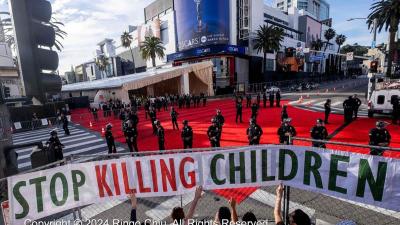 "Stop Killing Children" banner stops traffic at the Oscars, March 10, 2024.