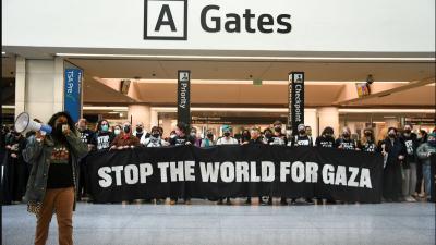 Hundreds of protestors shut down SFO International Terminal, demanding permanent #CEASEFIRE in war on #Gaza and an end to US arms to Israel.