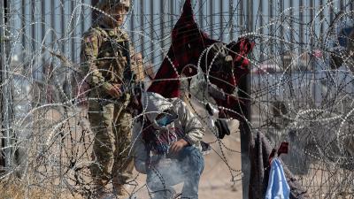 National Guard apprehends migrants on the Rio Grande in El Paso, Texas, March 21, 2024.
