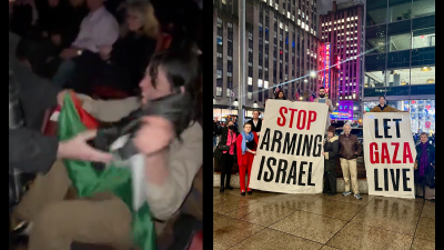 The fundraiser was repeatedly disrupted and two banners were hung from the mezzanine: “Stop Arming Israel” and “Let Gaza Live.” (Credit: @jvplive)
