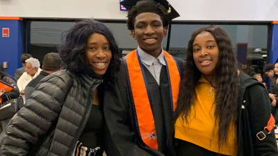 Dexter Reed, center, along with his mother Nicole Banks and sister Porscha Banks, 2019.