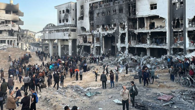 Palestinians search for bodies in the rubble at Al-Shifa Hospital earlier in April, 2024.