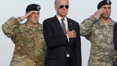 Genocide Joe Biden when he was Vice President with Army Chief of Staff Gen. Mark Milley, Vice President Joe Biden at Dover Air Force Base, Del in 2016.