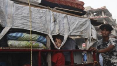 Refugees - boy and younger boy