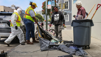 San Francisco sanitation workers throw out belongings of homeless man, July 30, 2024.