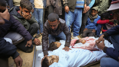 Father mourns his three children killed by Israeli airstrike in Khan Younis, Gaza, November 21, 2024.