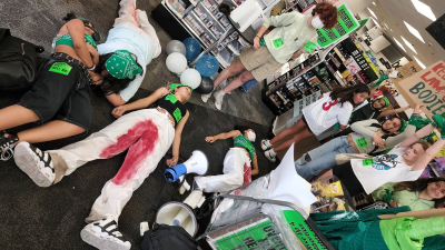 Bloody pants die-in disrupting business as usual for abortion rights. This kind of simple disruptive action can and should be done NOW, including by people who are very new to this.
