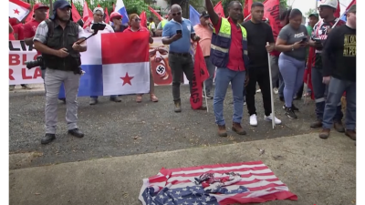 In Panama protestors burn U.S. flag on January 20, outraged at Trumps threats to take over the Panama Canal.