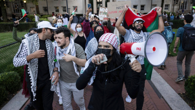 Palestinian supporters, (Mahmoud Khalil, second from left) protest genocide in Gaza at Columbia University, October 12, 2023.