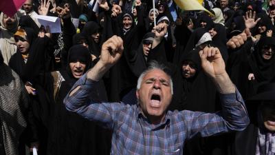 People in Tehran condemn Israeli attacks on multiple cities across Iran, June 20, 2025.