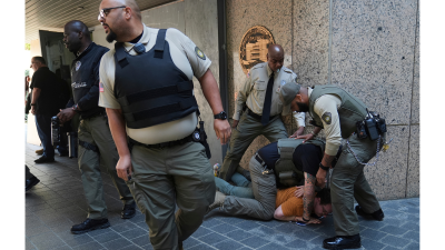 Federal police arrest a protester in Los Angeles, June 6, 2025.
