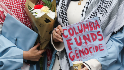 Columbia student with pro-Palestinian graduation cap