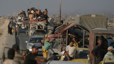 Displaced Palestinians flee the northern Gaza Strip, August 30, 2025.