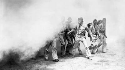 U.S. troops in Panama participate in a chemical warfare training exercise with smoke during World War II.