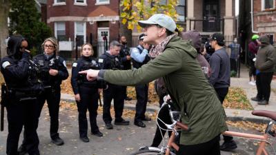 People protest ICE actions in Little Village, Chicago, November 8, 2025.
