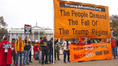 This past Saturday Refuse Fascism, working with others, marshaled over 250 people to surround the White House with yellow crime tape.