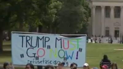 The University of North Carolina at Chapel Hill community rallied in support of a professor accused of being affiliated with an anti-fascist organization.