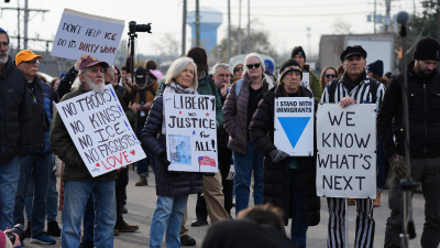 Protesters gather outside an ICE processing facility in the Chicago suburb of Broadview, November 21, 2025.