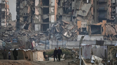 Destroyed apartment buildings at the Al-Shati camp in Gaza City, November 18, 2025.