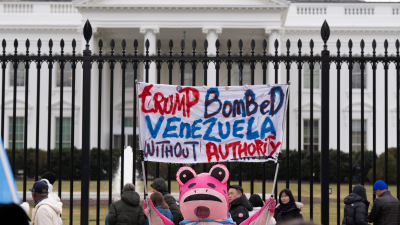 Protest sign at White House: “Trump Bombed Venezuela Without Authority”