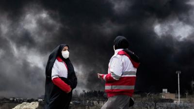 Smoke rises from a U.S.-Israeli strike on an oil factory in Tehran, Iran, March 8, 2026.