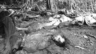 Slain bodies of massacred victims in village of El Mozote, El Salvador, 1981