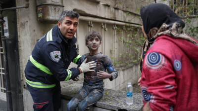An injured boy after a strike that hit a residential building, Tehran, Iran, March 28, 2026.