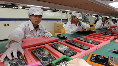 Most Apple iPhones were assembled at this Foxconn factory in southern China. Foxconn employed 450,000 workers.