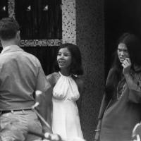 Women at a bar and passing U.S. soldiers in Saigon on May 28, 1971.