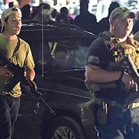 Rittenhouse with gun at protest