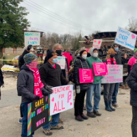 Rally by Planned Parenthood supporters outside the remains of the Knoxville clinic
