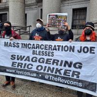 RevComs with banner "Mass Incarceration Joe Blesses Swaggering Eric Oinker."