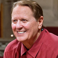 Bob Avakian in red shirt