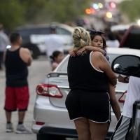 Scene where at least 53 immigrants suffocated in back of trailer.
