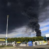 Smoke rises from the oil depot after missiles struck the facility in an area controlled by Russian-backed separatist forces in Makiivka, 15 km (94 miles) east of Donetsk, eastern Ukraine, Wednesday, May 4, 2022. 