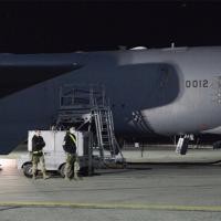 USAF bomber being loaded with nuclear air launched cruise missiles for Ukraine.