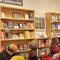 Andy Zee spoke at the holiday open house and fundraiser held at Revolution Books in NYC on December 11.