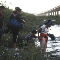 Venezuelan migrants cross Rio Bravo from Ciudad Juarez, Mexico to U.S., October 13, 2022.
