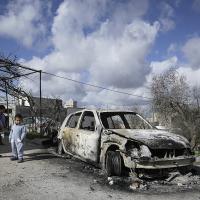 Israeli settlers attack Palestinians, burn their car, January 30, 2023.