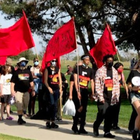 Revcoms marching