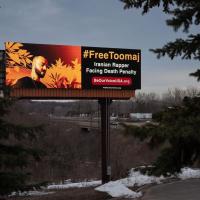 A digital billboard calling to free 33-year-old rapper Toomaj Salehi, along a road about 20 miles outside of Minneapolis, Minnesota.