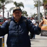 Helping the REVCOMS distribute the broadsheet.