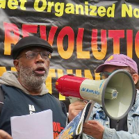 Carl Dix speaks to people in SoHo, New York City, protesting the murder of Jordan Neely.