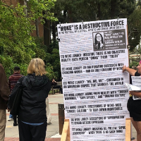 Revcoms on the UCLA campus building for Sunsara’s talk: “Woke” Lunacy Vs. Real Revolution.